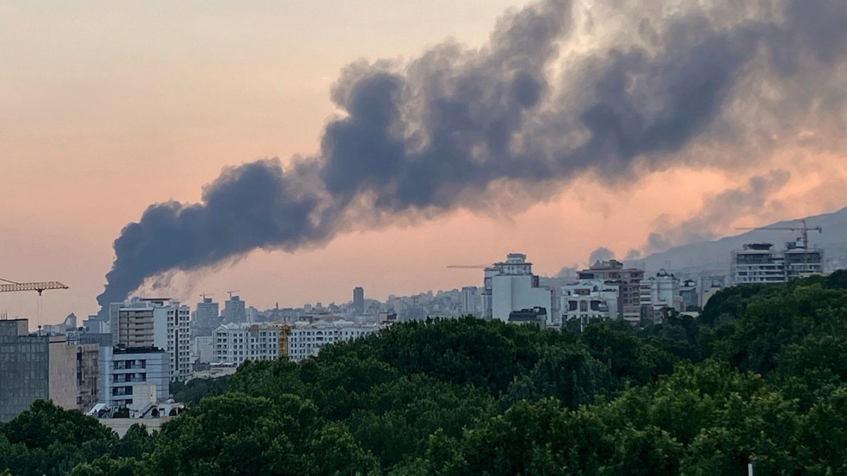 Smoke rises from Iran state-run TV