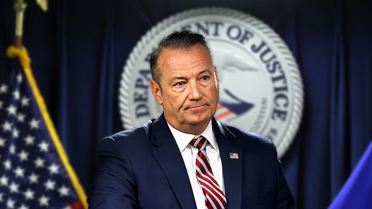 Todd Lyons speaking at a press conference