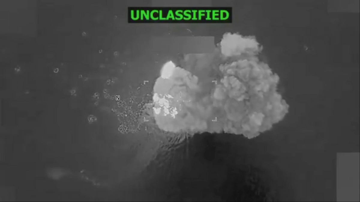 Moment of strike showing explosion.