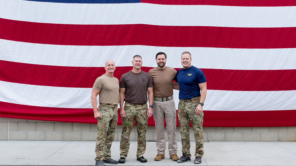 Vance, SEALs and American flag