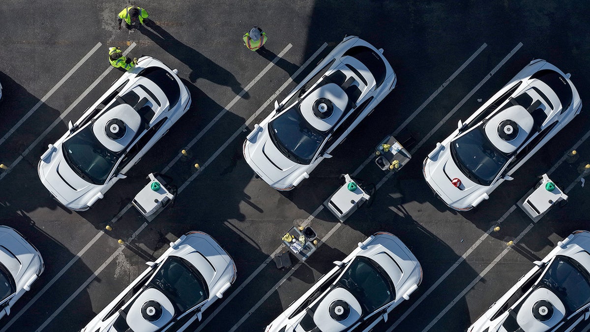 Waymo robotaxis parked at facility