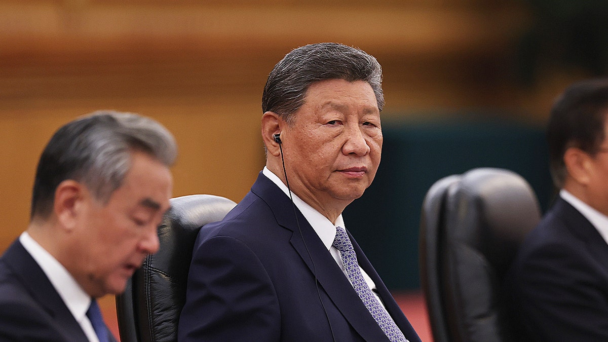Chinese President Xi Jinping speaks at the beginning of a bilateral meeting