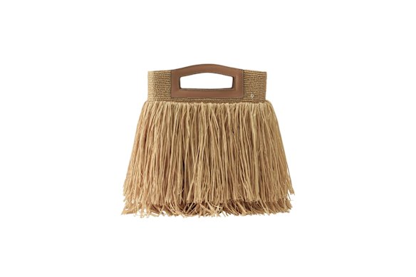 Helena Minski “Bailey” raffia fringe tote, $695.

