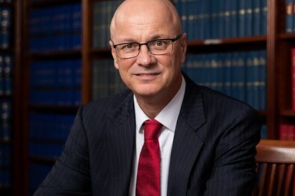 Mark Dennis SC, a prominent barrister from Sydney, will face court on child abuse material charges after returning from Cambodia.