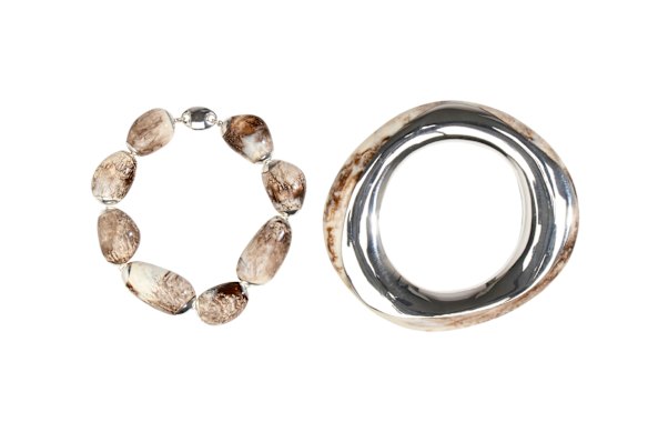 Dinosaur Designs “Rock Wishbone” bangle, $390, and choker in “Cappuccino”, $1010.

