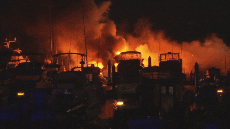 Superyachts burn and sink near Spit Bridge