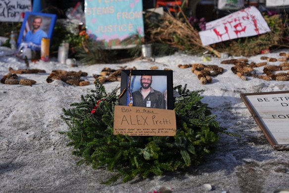 A makeshift memorial is placed where Alex Pretti was fatally shot by a US Border Patrol officer.