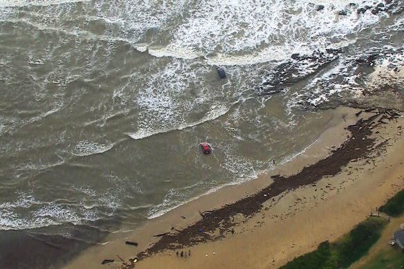 Cars remains stranded at Wye River on Friday morning. 