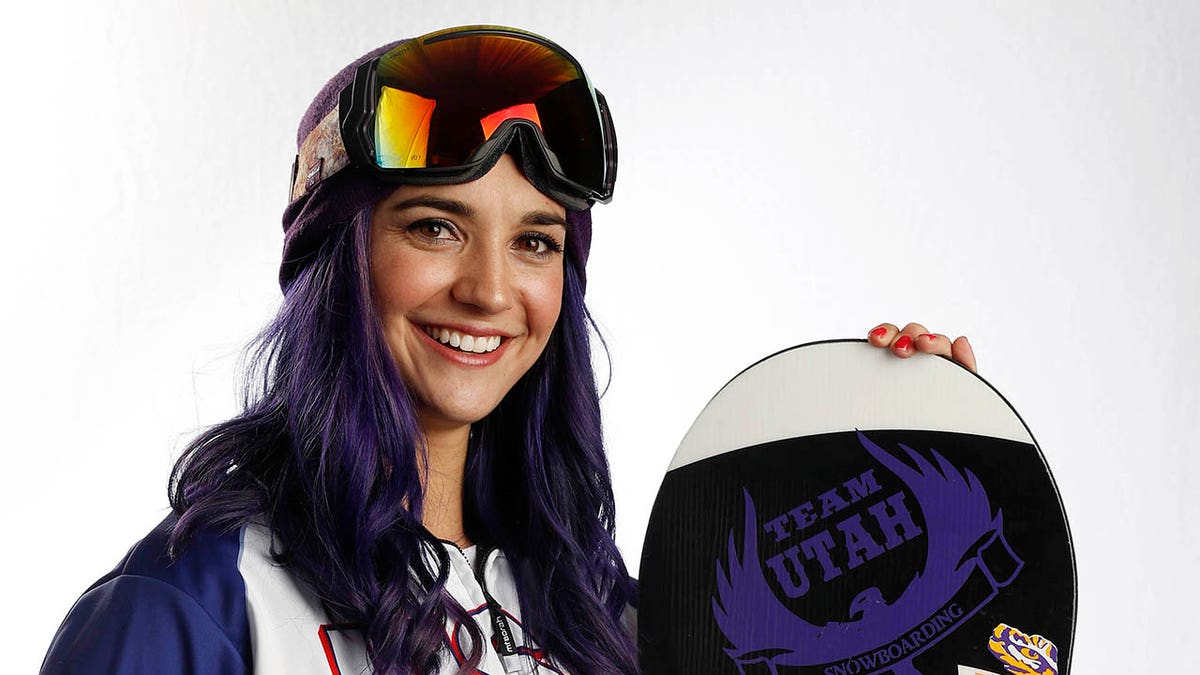 Brenna Huckaby looks on