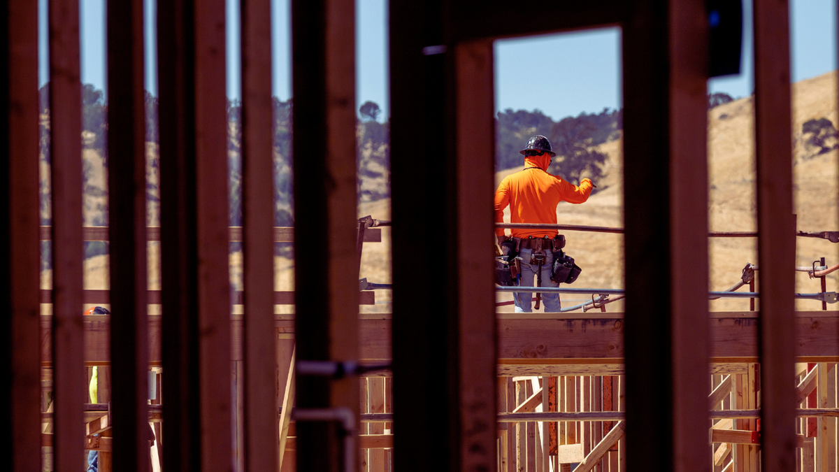 A worker at the site of a new home construction.