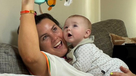 You have to laugh: Charlotte Mortlock with her baby.