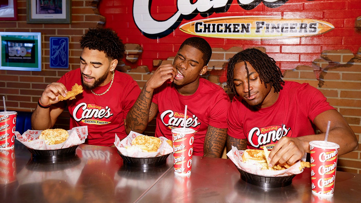 Elijah Sarrat, Jamari Sharpe and D'Angelo Ponds at Raising Cane's
