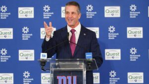 Giants part with longtime executive one day after John Harbaugh introduced as head coach