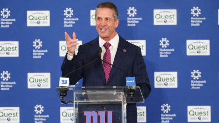 Giants part with longtime executive one day after John Harbaugh introduced as head coach