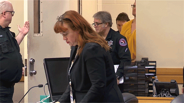 Michael McKee walks into court