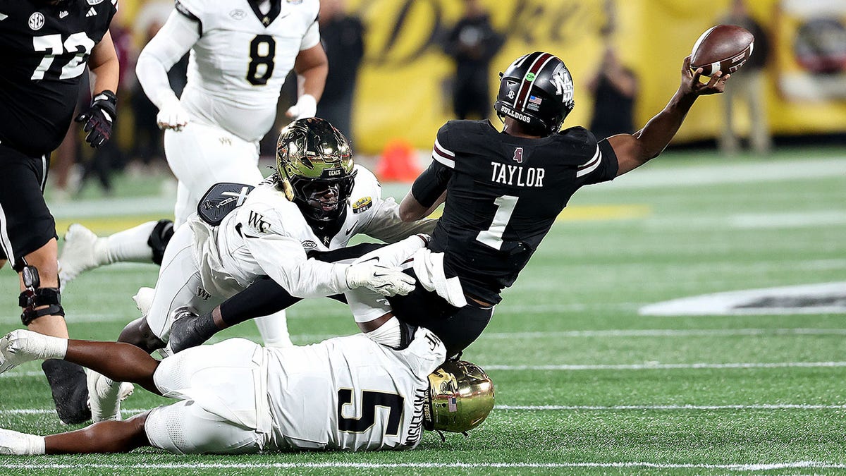 Kamario Taylor gets tackled