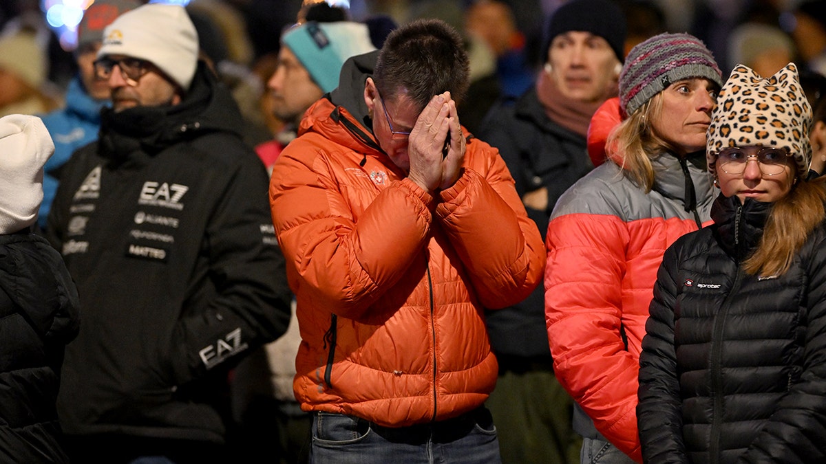 Mourners at scene where fire erupted in Switzerland