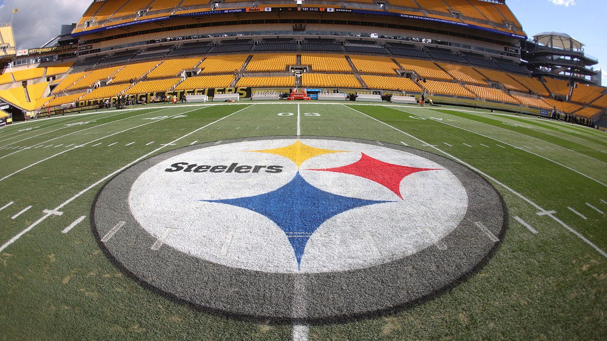 Pittsburgh Steelers logo at mid-field