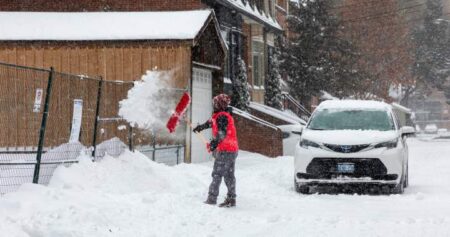 Shovelling snow can put strain on your heart. How to stay safe as millions dig out