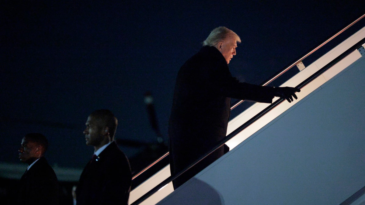 Trump boards Air Force One