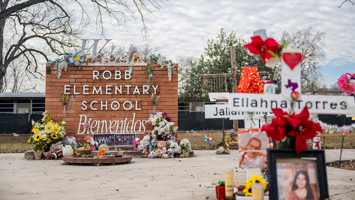A memorial dedicated to the 19 children and two adults murdered