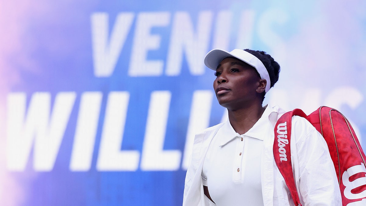 Venus Williams walks on the tennis court