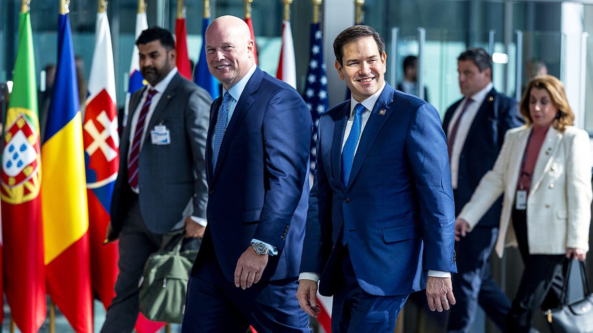 US Secretary of State Marco Rubio (R) and the newly appointed US Permanent Representative to NATO Matthew Whitaker (L)