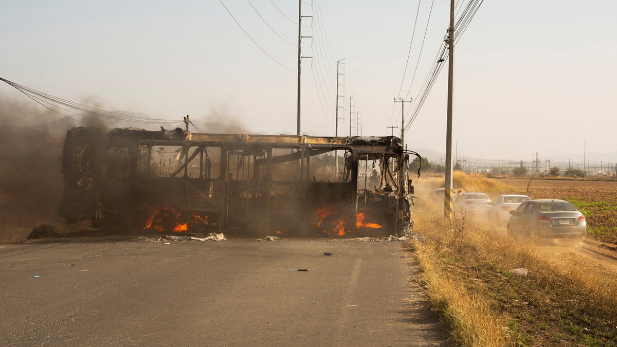 Burning bus used as a barricade in Mexico