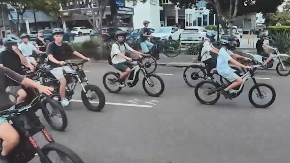 About 20 teens rode e-bikes and e-scooters through Brisbane on January 23.