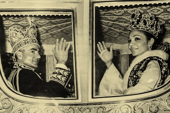  The shah of Iran and empress Farah wave as they ride through the streets of Tehran after their coronation ceremony in 1967.