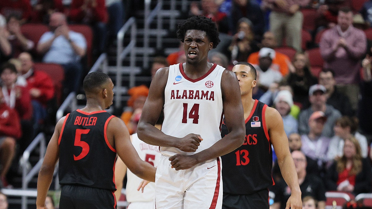 Charles Bediako reacts on court