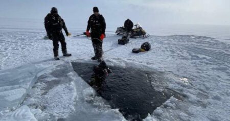 Snowmobilers fall through ice, bodies recovered days later after lake refreezes: RCMP