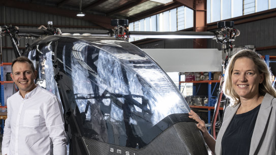 Siobhan Lyndon
and Andrew Moore from AMSL Aero with the Vertiia eVTOL aircraft they have designed and are now testing.