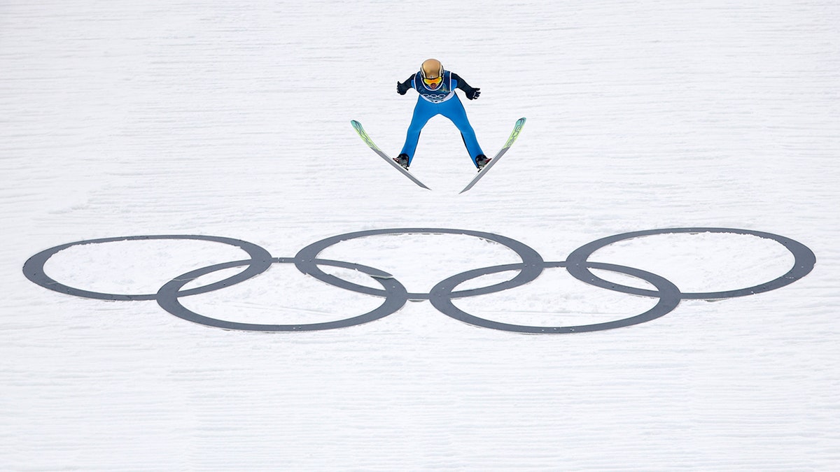 A Finnish ski jumper at a trial round