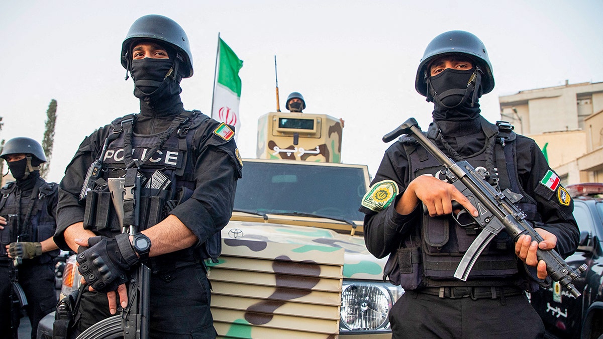 Iranian police on the scene as people celebrate the ceasefire