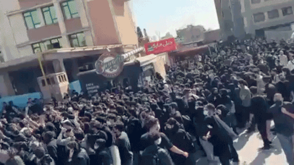 Iran president vows defiance as protests build against regime amid US military build up