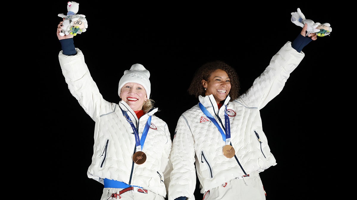 Kaillie Armbruster Humphries and Jasmine Jones at the medal podium