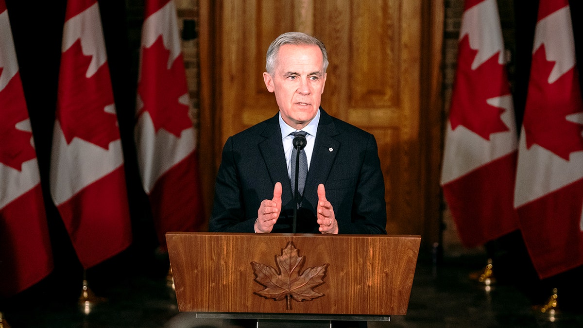 Mark Carney speaking at a podium in Quebec City.
