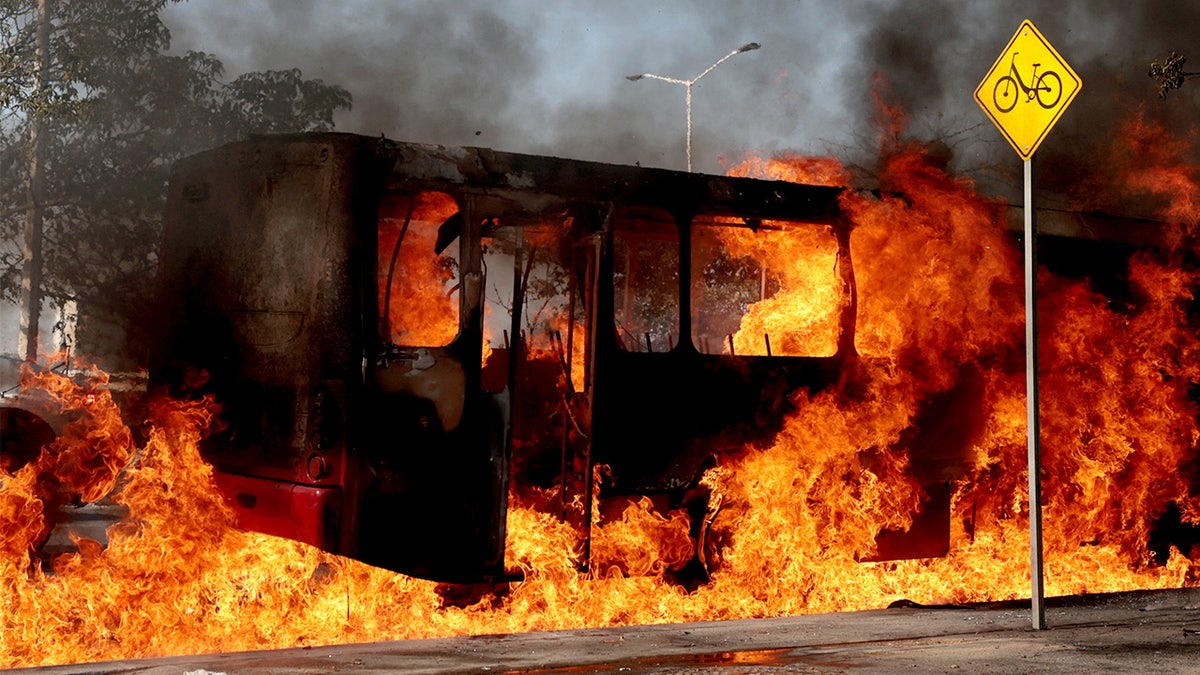 Bus set ablaze in Jalisco amid security crackdown.