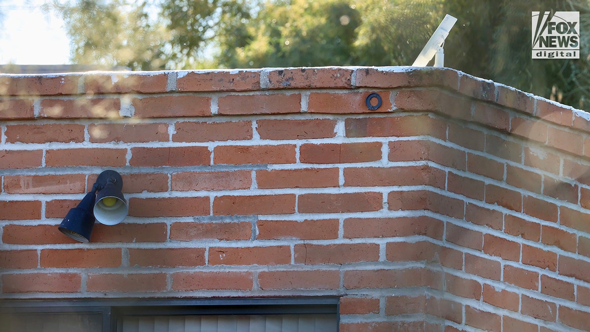 Nancy Guthrie's home with security camera bracket attached to the exterior