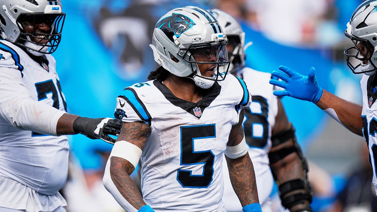 Rico Dowdle celebrates with his teammates