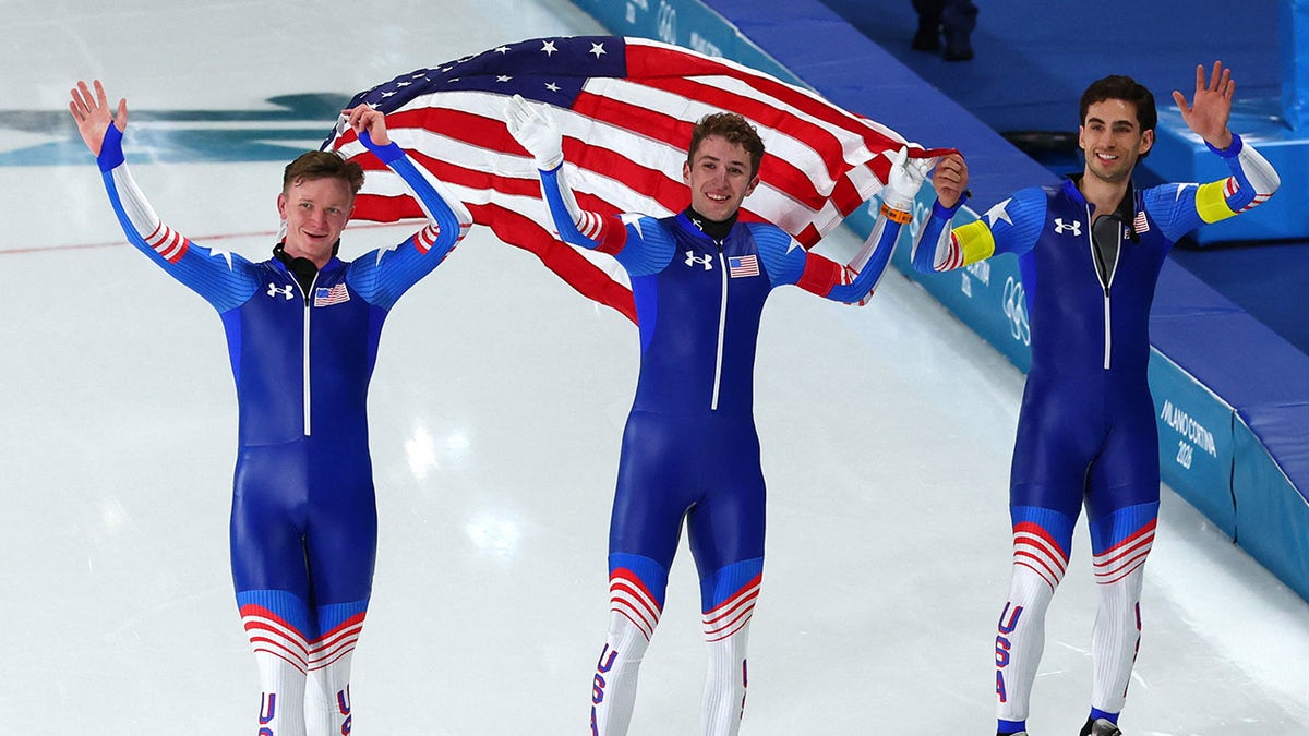 Team USA members celebrate a silver medal