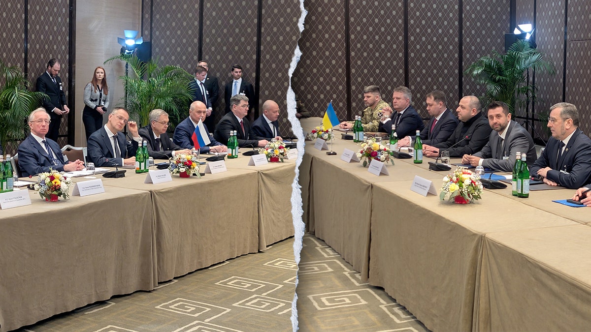Members of Ukraine’s delegation (right) and Russia’s delegation (left) sit at a conference table ahead of trilateral negotiations in Geneva.
