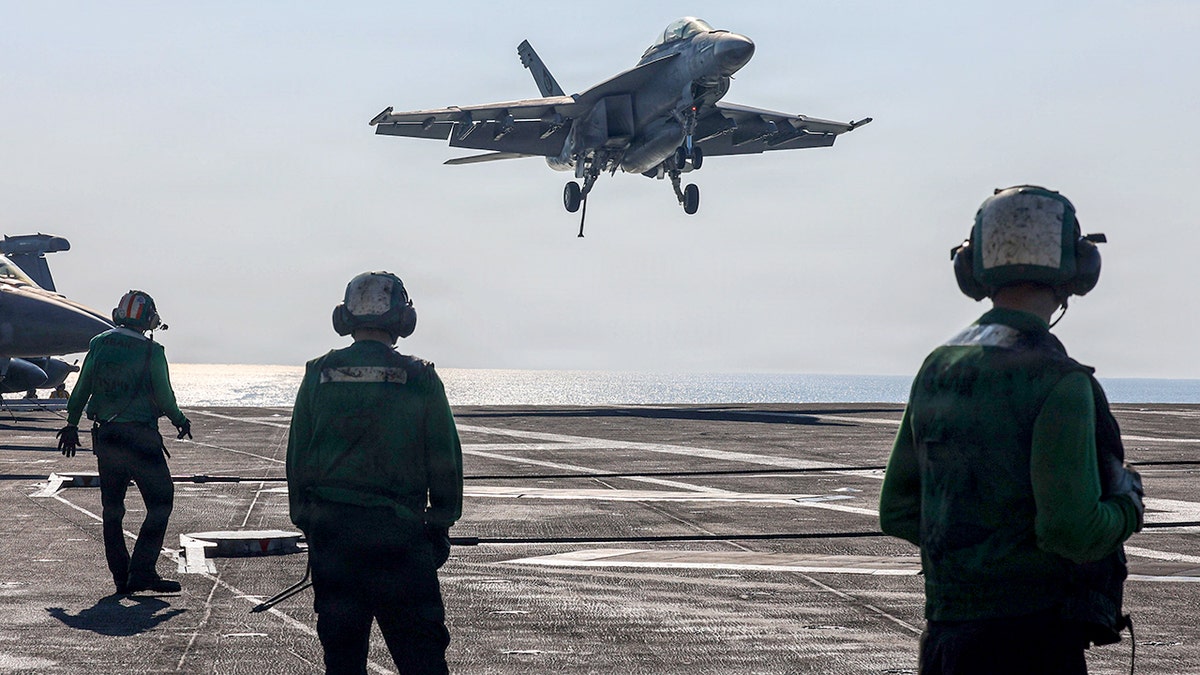 US fighter jet lands on USS Abraham Lincoln
