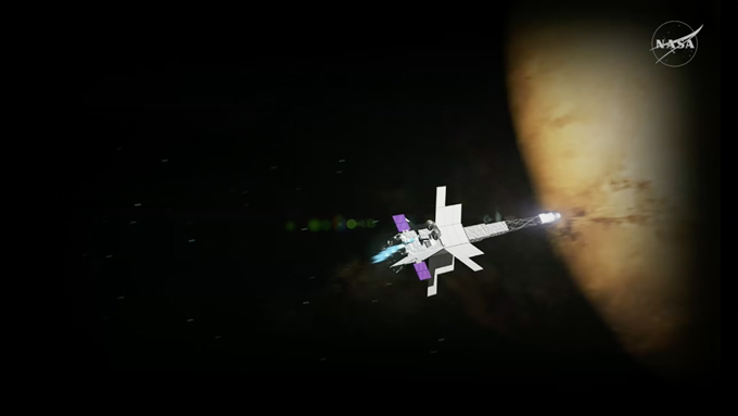 A spacecraft is shown in space, with Mars in the background.