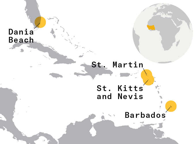 A map shows highlighted locations of Dania Beach, St. Martin, St. Kitts and Nevis and Barbados. In the corner is a globe which also has parts of West Africa highlighted.