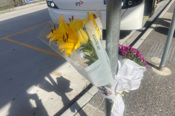 Flowers left at Mernda station on Saturday.