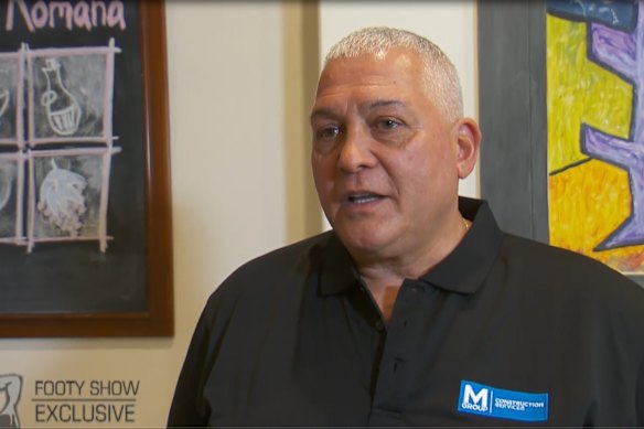 Mick Gatto wearing a shirt with an M Group logo in 2017. 