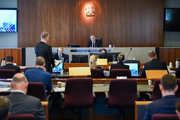 Commissioner Stuart Wood listens to senior counsel assisting, Patrick Wheelahan, during last month’s hearings.