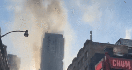 Explosions from building rooftop fire shut down streets in downtown Toronto